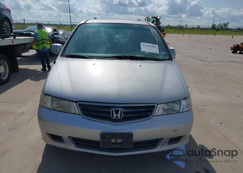 2004 Honda Odyssey Ex-L z USA, uszkodzony, nr VIN 5FNRL18094B087221